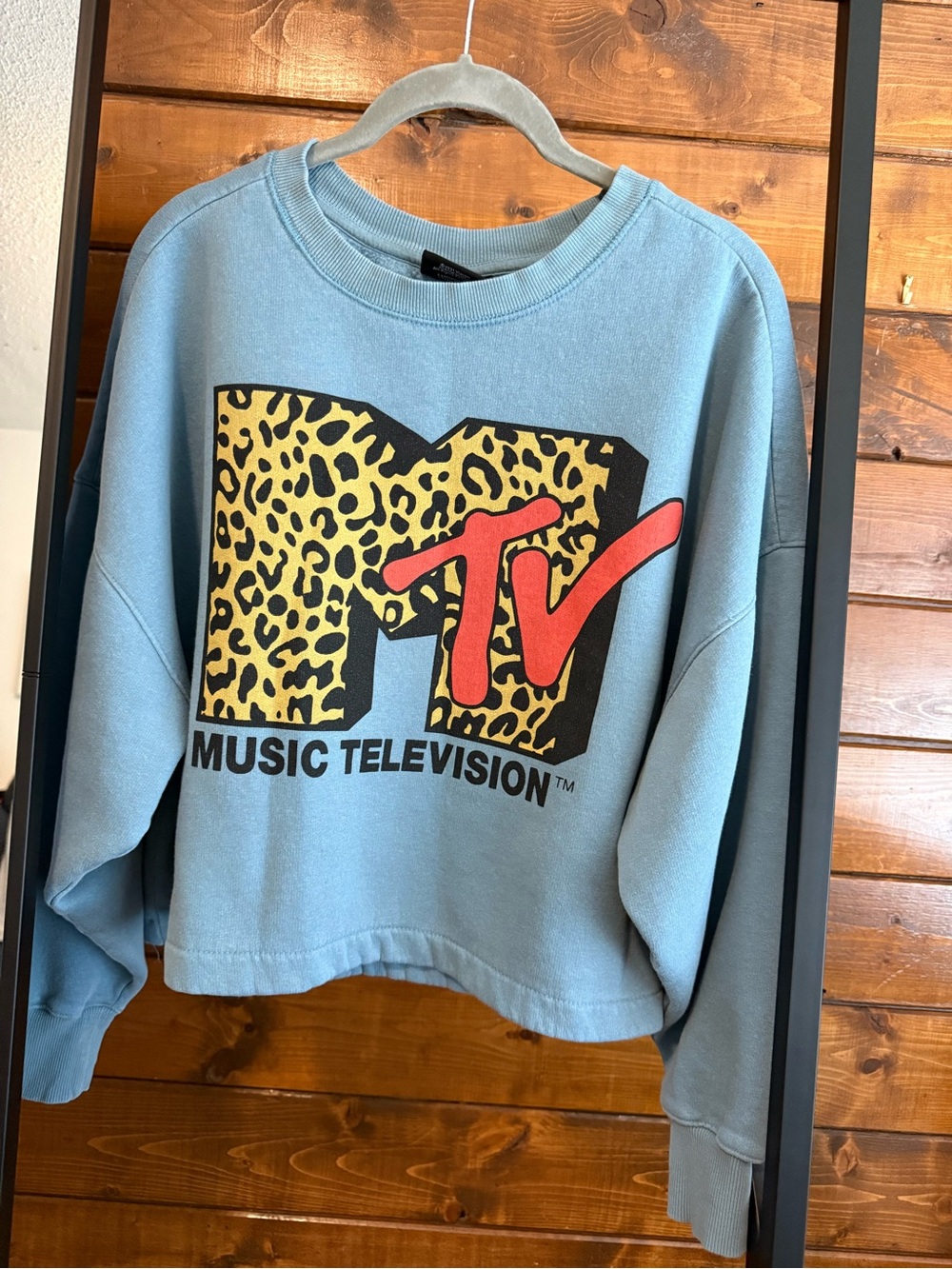 MTV Blue Sweatshirt with Leopard Logo and Red Accent